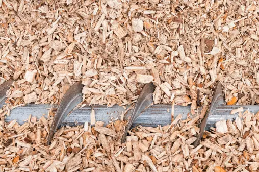 Which side of the mulching blade goes down?